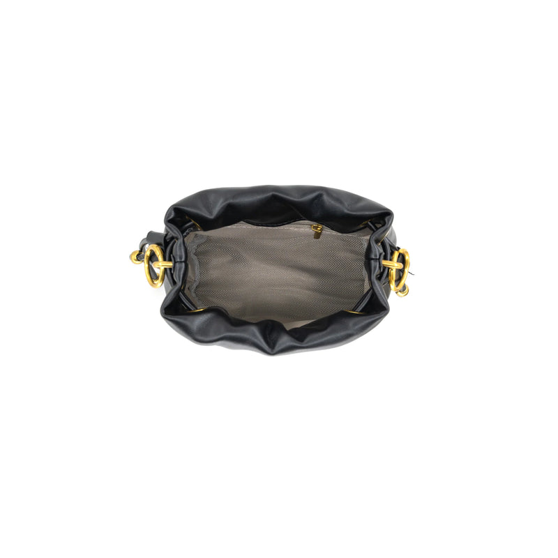 Small black bag featuring gold hardware and a soft, slouchy design, ideal for accentuating any outfit in Long Island boutique fashion.
