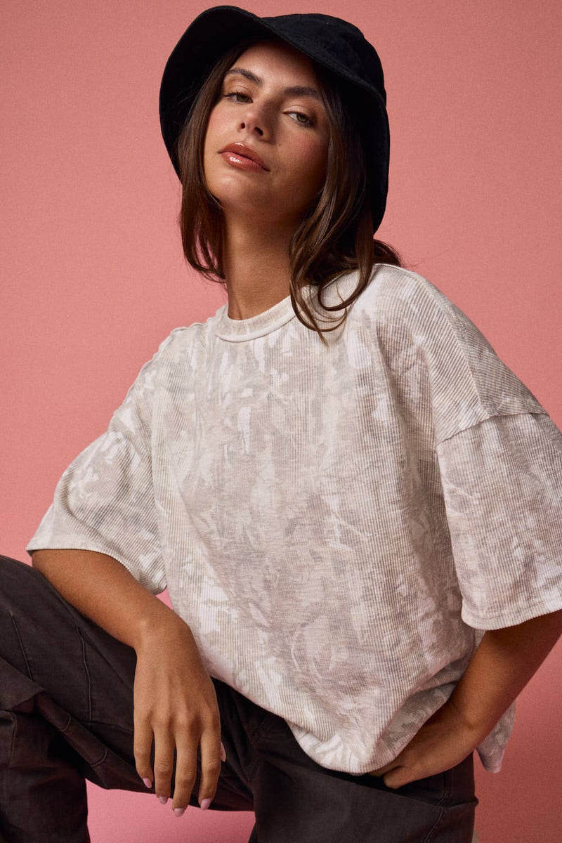 Loose fit camo ribbed shirt in soft beige tones, perfect for casual wear, representing chic Long Island boutique fashion.