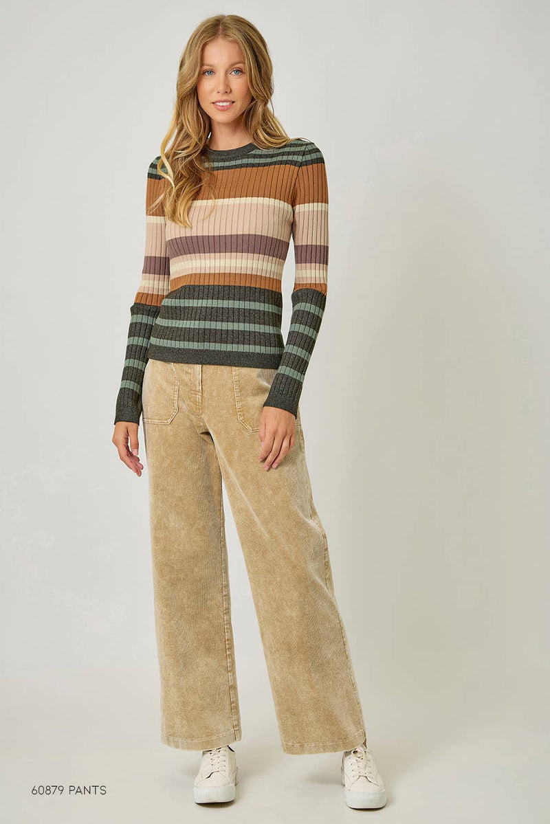 Ribbed, fitted color block striped sweater top in earthy tones, perfect for layering, embodying Long Island boutique fashion.