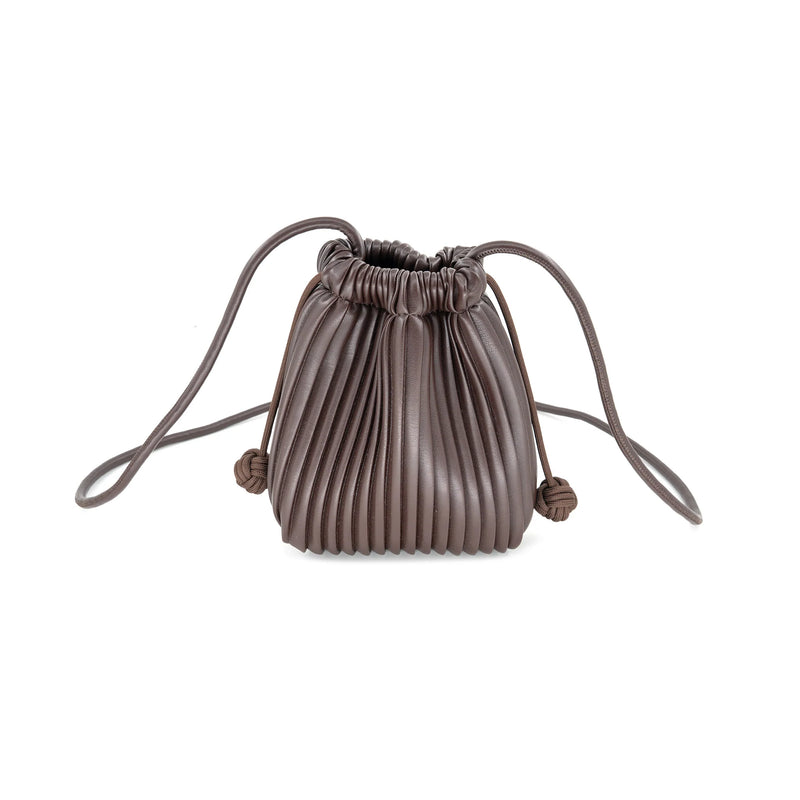 Small brown crossbody bag featuring a pleated design and drawstring closure, perfect for stylish outings in Long Island boutique fashion.