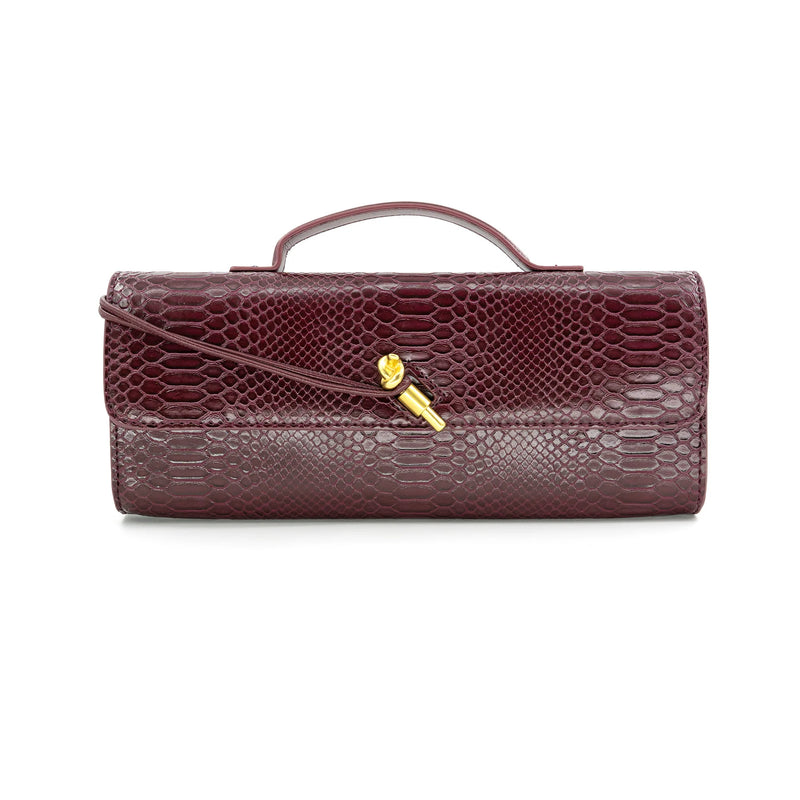 Chic burgundy mini bag/clutch featuring a textured snakeskin pattern and a gold accent, perfect for Long Island boutique fashion.