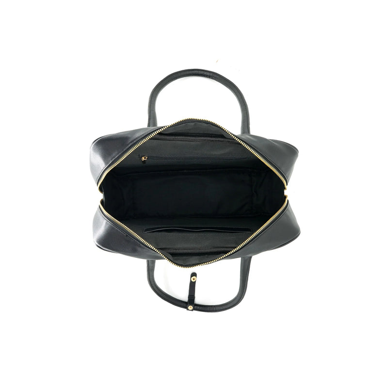 Stylish black BC Boxy Bag with gold zipper detail, offering ample storage, perfect for complementing any outfit in Long Island boutique fashion.