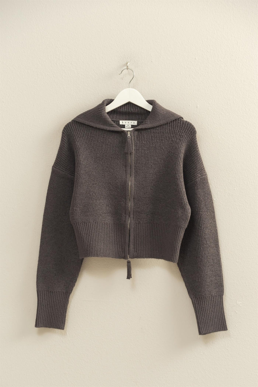 Cropped front zip collared cardigan in a rich charcoal hue with a textured knit, perfect for cozy layering in Long Island boutique fashion.