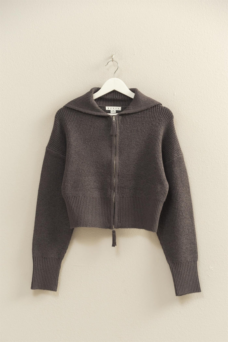 Cropped front zip collared cardigan in a rich charcoal hue with a textured knit, perfect for cozy layering in Long Island boutique fashion.