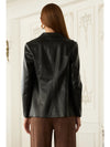 Sleek black faux leather open blazer with a modern fit, perfect for layering in stylish Long Island boutique fashion.