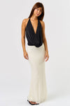 Sleek black cowl bodysuit with a deep neckline, paired with a flowing ivory maxi skirt, ideal for trendy Long Island boutique fashion.