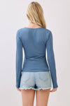 Fitted double layer V-neck long sleeve top in a soft blue hue, perfect for layering in Long Island boutique fashion.
