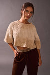 Crochet-textured acid wash sweater top in a soft beige tone, featuring a relaxed cropped fit, ideal for Long Island boutique fashion.