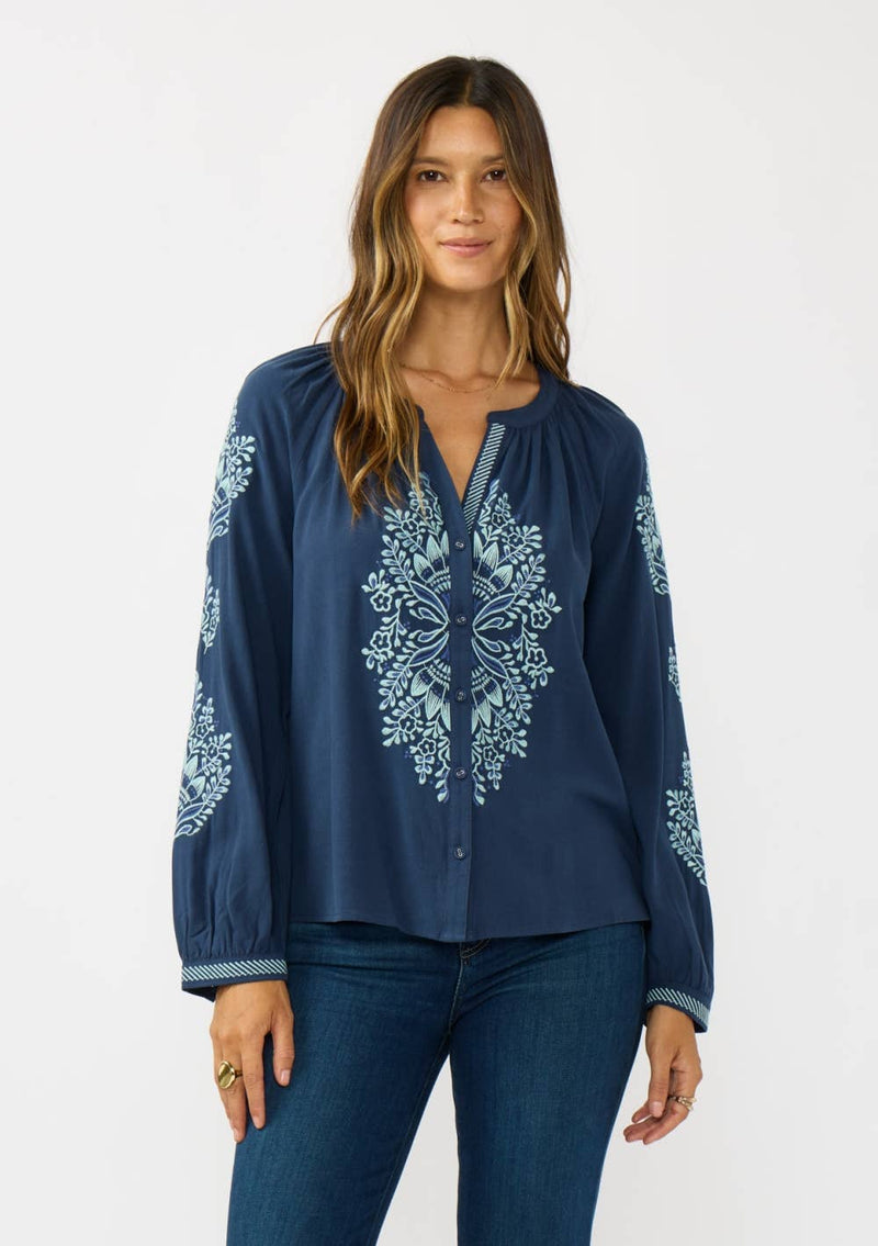 Navy embroidered raglan button blouse featuring intricate floral designs and soft, flowy fabric, perfect for Long Island boutique fashion.