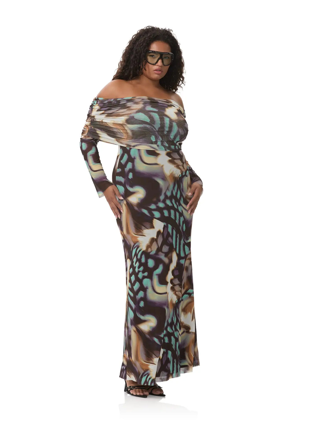 Off-the-shoulder maxi dress featuring a colorful feather swirl print, perfect for a stylish evening out from a Long Island women's boutique.