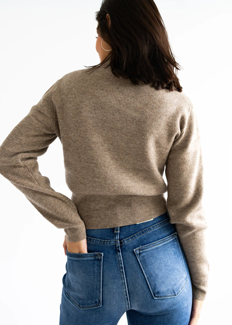 Elegant ASTR Tawni Cardigan in a cozy beige knit, featuring long sleeves and a fitted silhouette, perfect for layering in Long Island boutique fashion.