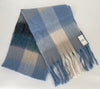 Plaid scarf with fringes and a tag on a white background