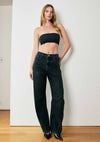 High-waisted barrel baggy jeans in dark wash with a relaxed fit, perfect for effortlessly chic Long Island boutique fashion.