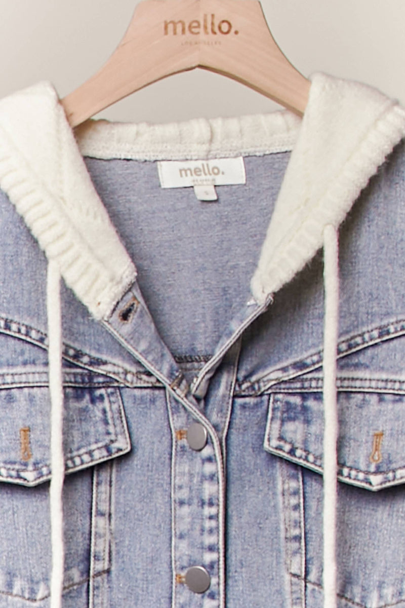 Light blue denim jacket with cable knit sleeves and a cozy hood, ideal for stylish layering in Long Island boutique fashion.