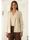 Elegant faux leather open blazer in a soft beige, tailored fit with subtle pockets for a chic addition to any Long Island boutique fashion wardrobe.