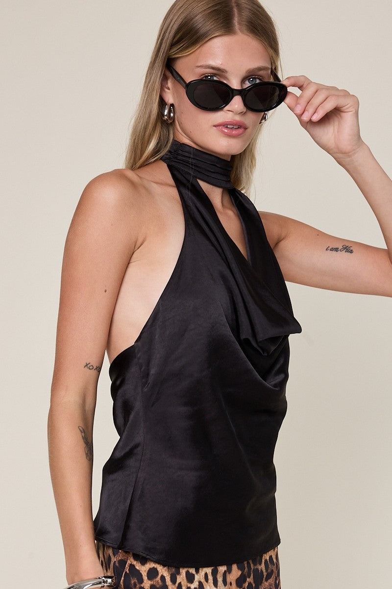 Sleek black cowl neck top with an open back, perfect for chic evenings out in Long Island boutique fashion.
