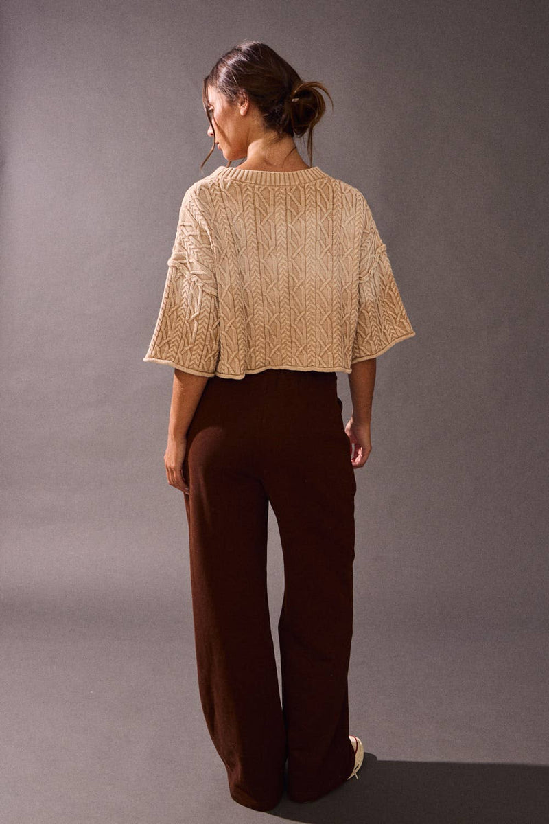 Relaxed-fit, acid wash sweater top in soft beige with textured diamond patterns, perfect for casual Long Island boutique fashion.