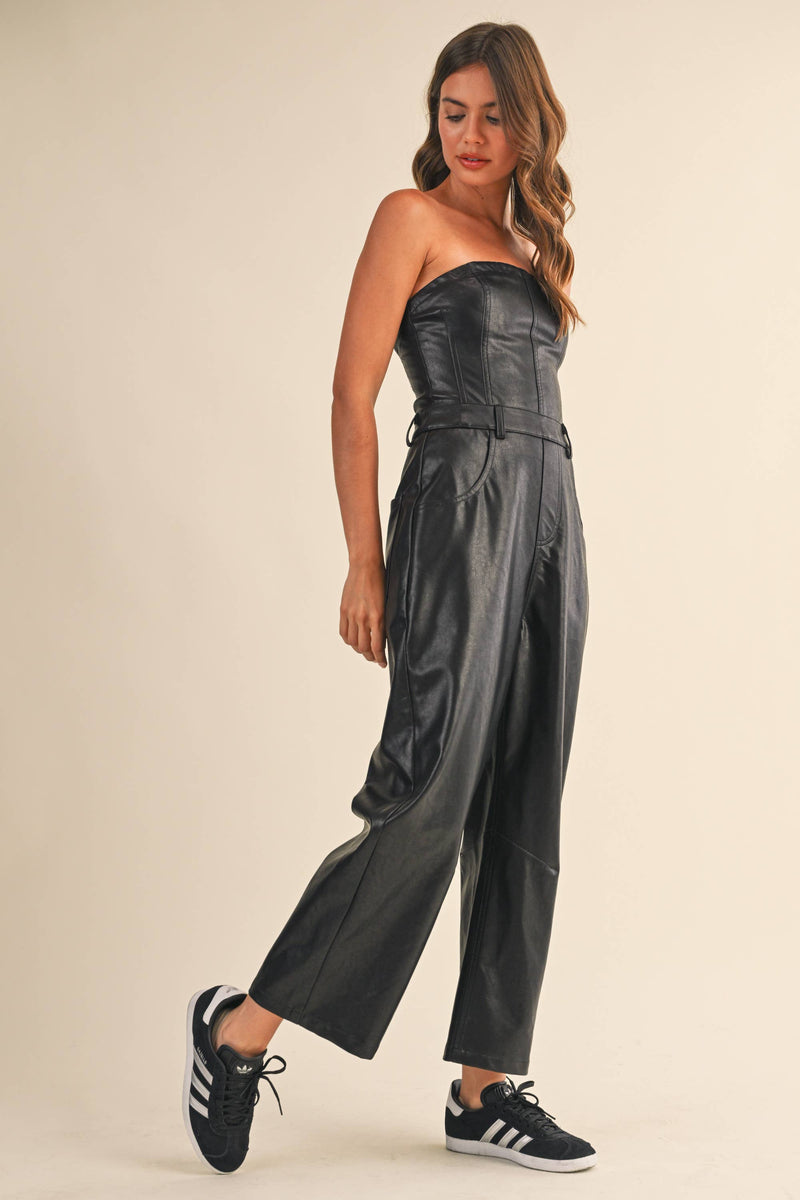 Strapless faux leather jumpsuit in sleek black, featuring a fitted bodice and wide-leg silhouette, ideal for Long Island boutique fashion.