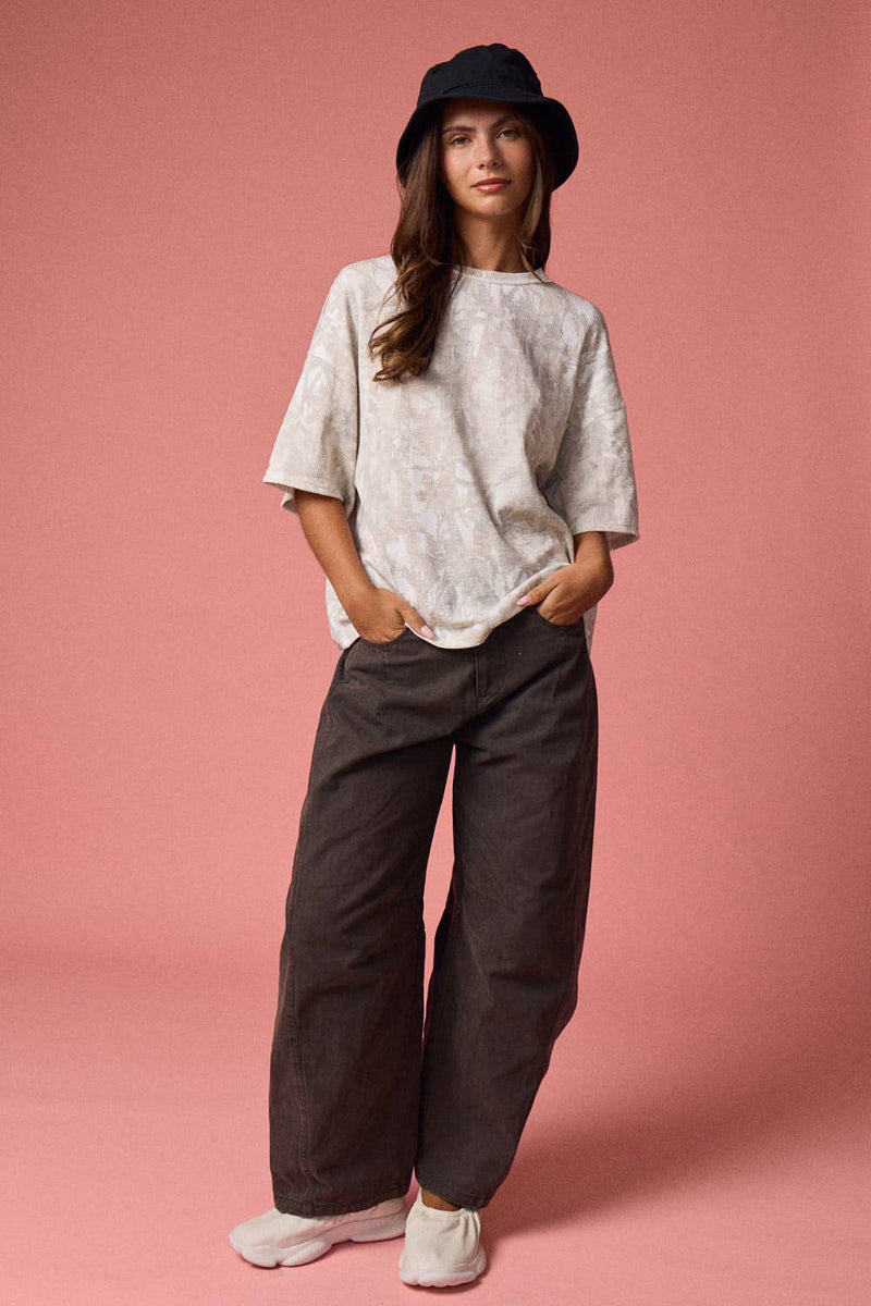 Loose fit camo ribbed shirt in soft gray tones, paired with relaxed dark pants, perfect for casual Long Island boutique fashion.