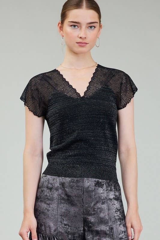 Sleek black glitter woven sweater featuring delicate lace sleeves and a flattering V-neck, ideal for Long Island boutique fashion enthusiasts.