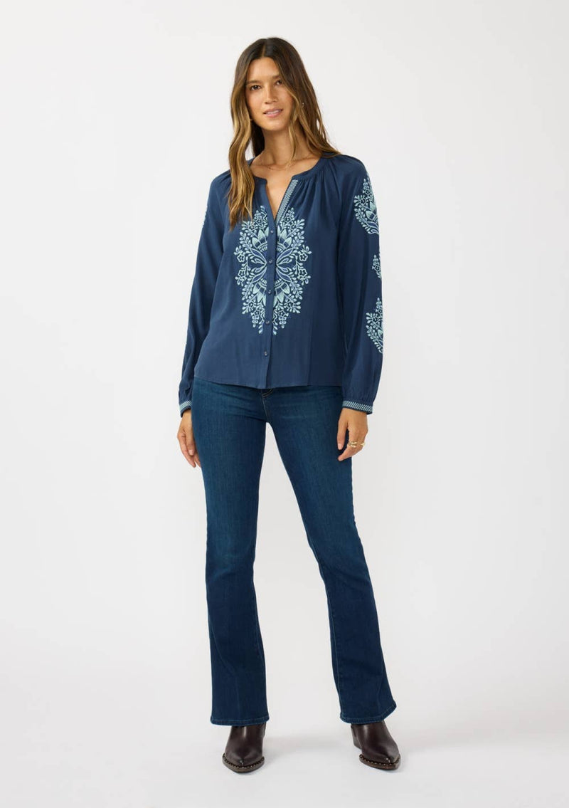 Navy blue embroidered raglan button blouse featuring intricate light blue floral patterns, perfect for Long Island boutique fashion.