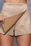 Soft beige front wrap faux suede short pants featuring a chic design, perfect for stylish outings in Long Island boutique fashion.