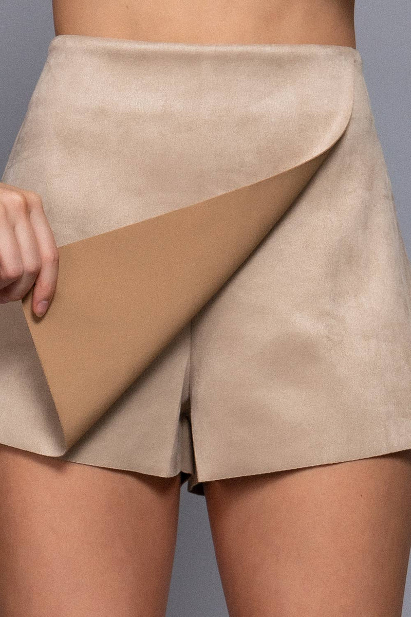 Soft beige front wrap faux suede short pants featuring a chic design, perfect for stylish outings in Long Island boutique fashion.