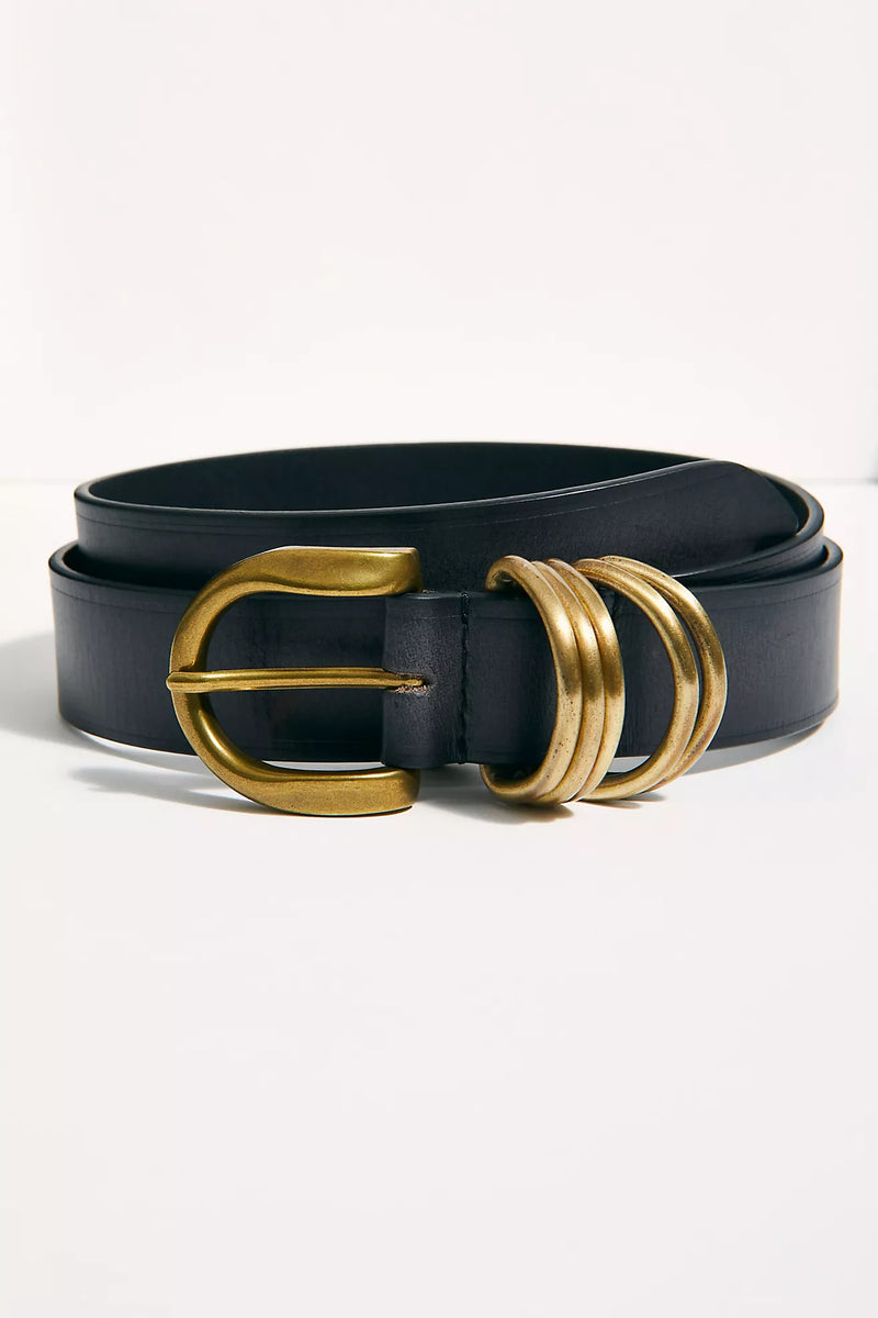 Sleek black leather belt with a bold gold buckle and three decorative rings, perfect for adding flair to any outfit in Long Island boutique fashion.