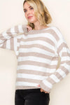 Super soft crew neck sweater featuring bold beige and white stripes, perfect for cozy yet stylish looks at a Long Island boutique fashion.