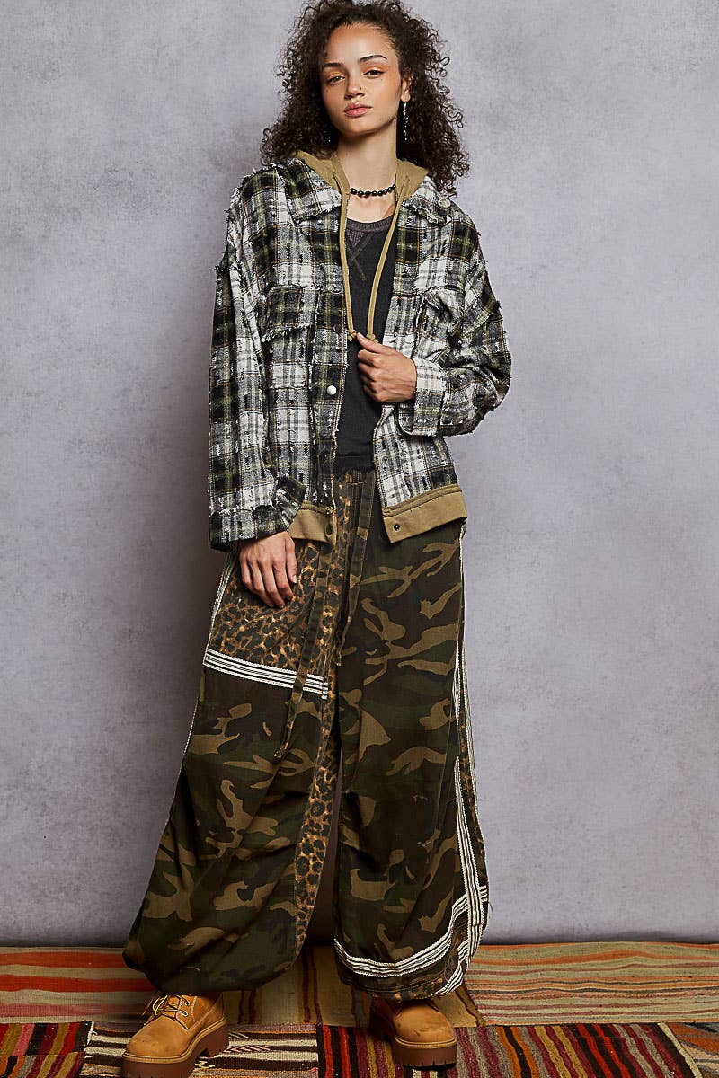 Women’s oversized hooded plaid shacket in olive and black — cotton button-down jacket with raw-edge detail, cozy fall outerwear by TandyWear Boutique Commack NY.