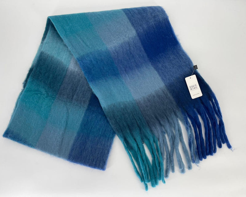 Blue plaid scarf with fringes on a white background
