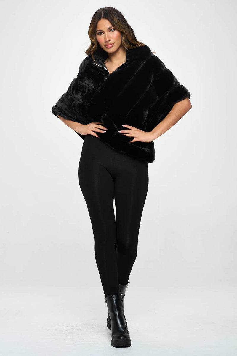 Chic black faux fur capelet featuring a cozy collar and a stylish wrap design, perfect for Long Island boutique fashion enthusiasts.