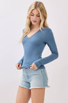 Fitted double layer V-neck long sleeve top in soft blue, perfect for layering with a stylish casual look at this Long Island boutique fashion.
