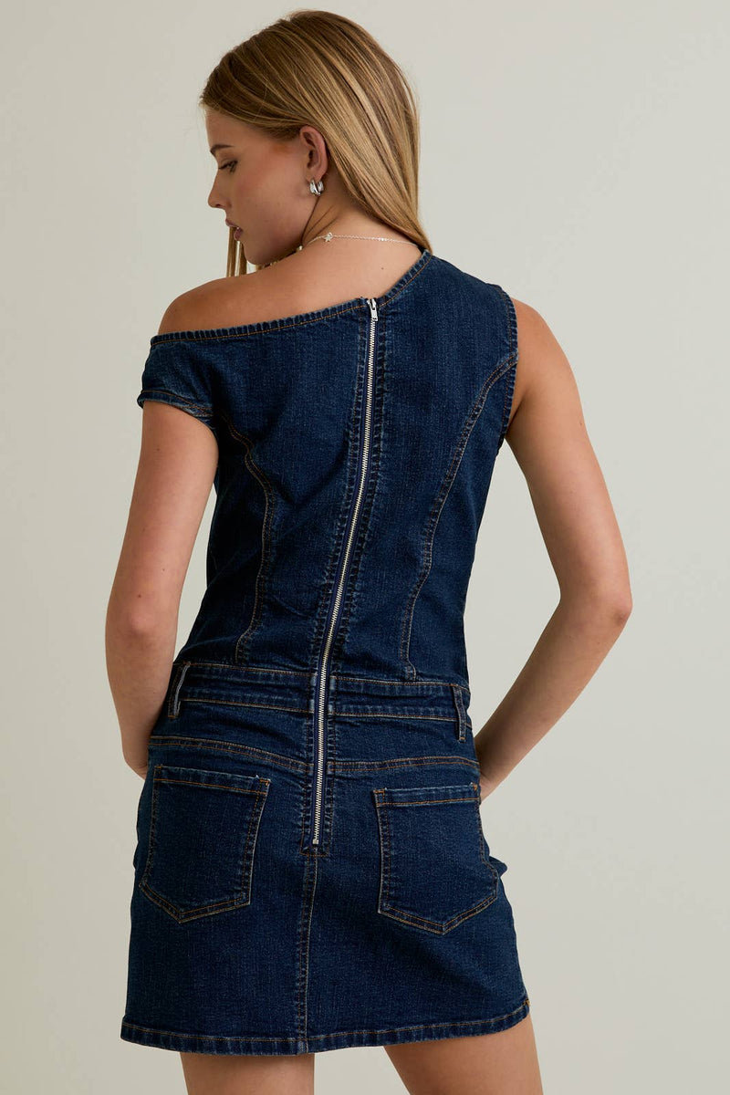 Asymmetrical shoulder denim dress in dark wash features a fitted silhouette and zip closure, perfect for chic Long Island boutique fashion.