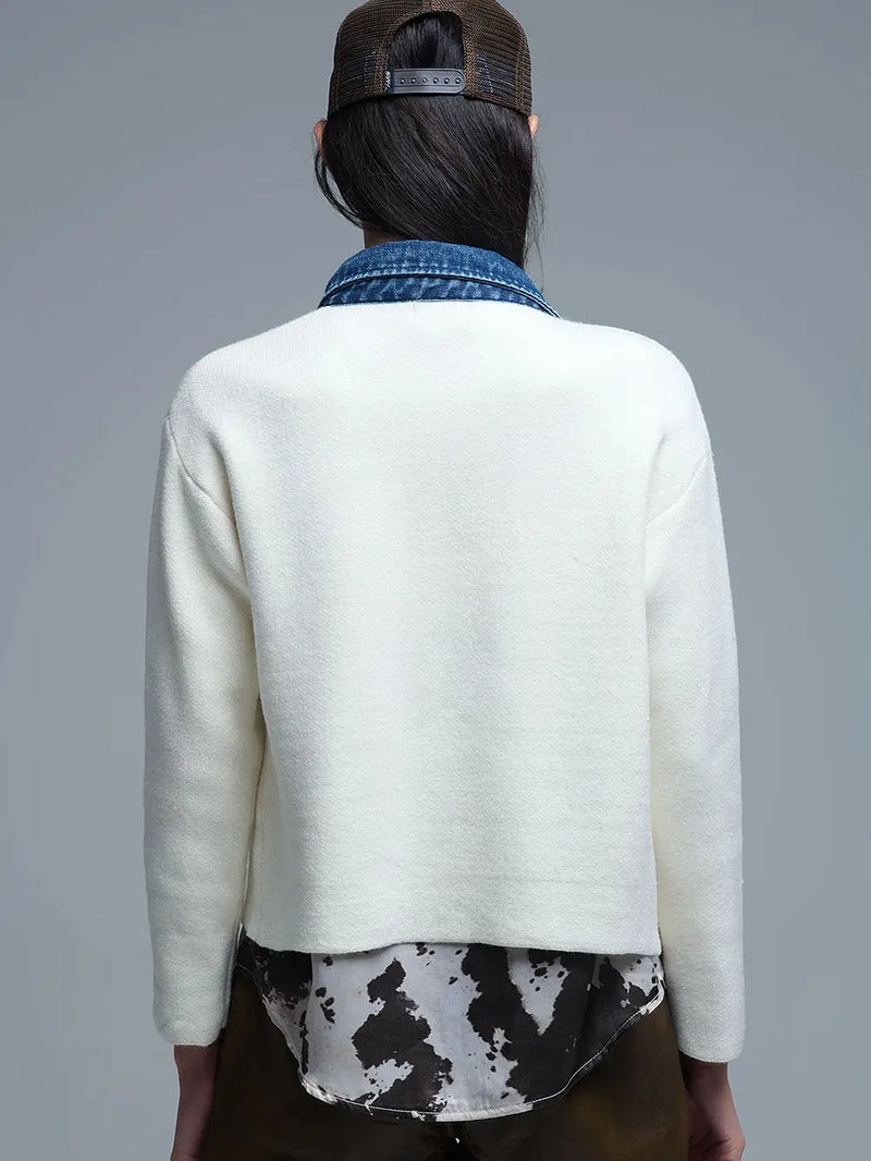 Cream knitted cardigan featuring a denim collar, perfect for layering in a stylish Long Island boutique fashion look.