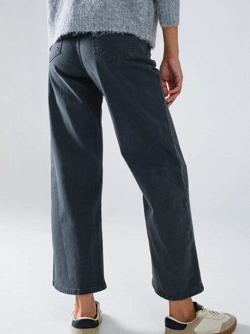 Model wearing gray Cropped Wide Leg Jeans made from stretch denim — relaxed cropped fit available at TandyWear Boutique in Commack, NY. back view