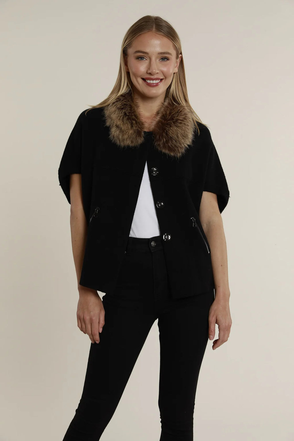 Short sleeve black cardigan featuring a luxurious faux fur collar, perfect for stylish layering in Long Island boutique fashion.
