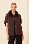 Short sleeve cardigan in rich brown with a faux fur collar and stylish zipper pockets, perfect for chic Long Island boutique fashion.