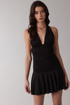 Black halter tie neck mini dress with a fitted bodice and flared skirt, perfect for casual outings in Long Island boutique fashion.