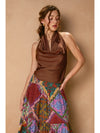 Sleek, brown satin halter neck top with an open back, perfect for stylish layering in a Long Island boutique fashion ensemble.
