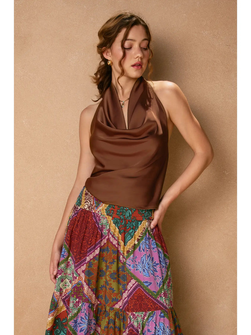 Sleek, brown satin halter neck top with an open back, perfect for stylish layering in a Long Island boutique fashion ensemble.