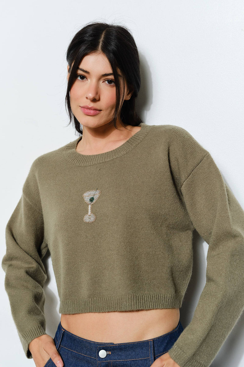 Cropped olive green sweater featuring a stylish martini bead design, embodying trendy Long Island boutique fashion.