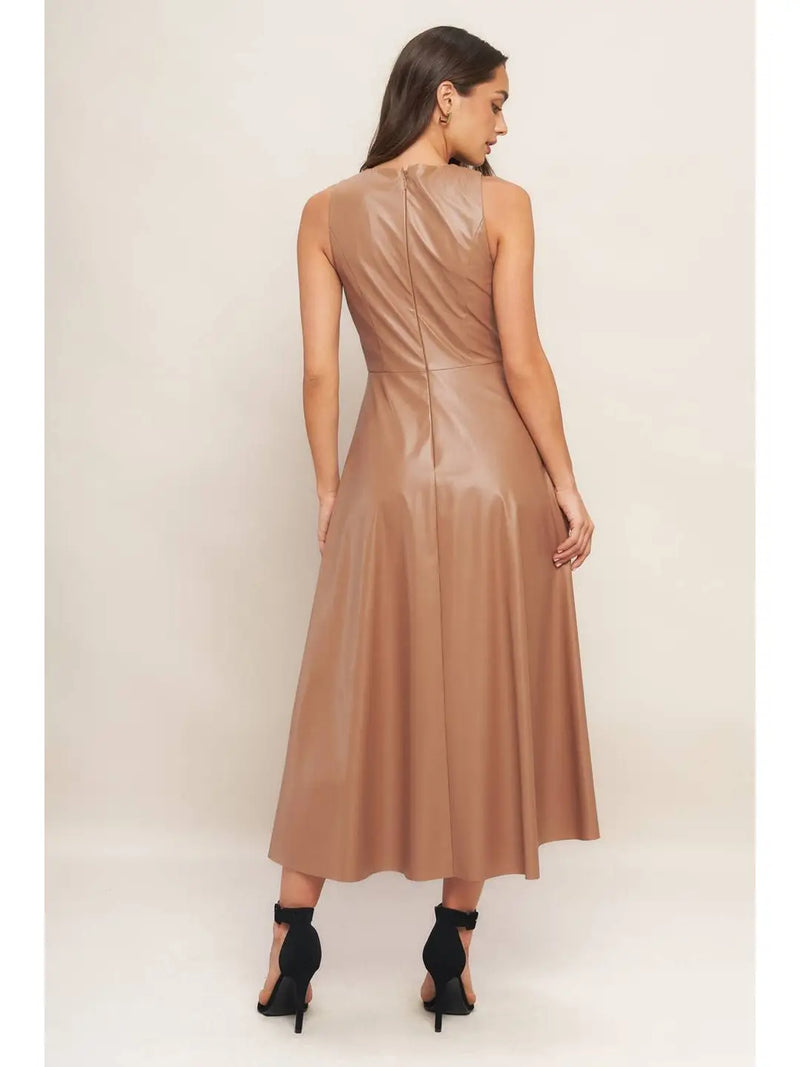 Faux leather midi dress in a warm taupe hue features a sleek silhouette with a flattering fit, ideal for Long Island boutique fashion.