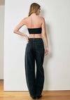High-waisted barrel baggy jeans in a dark wash, featuring a relaxed fit and classic five-pocket design, perfect for Long Island boutique fashion.