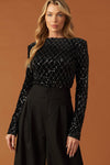 Black sequin bodysuit featuring a diamond-patterned design and long sleeves, perfect for Long Island boutique fashion occasions.