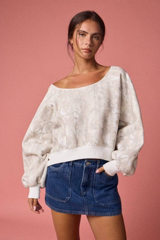 Off-shoulder camo print long sleeve top in a soft neutral palette, featuring balloon sleeves and a relaxed fit, perfect for Long Island boutique fashion.