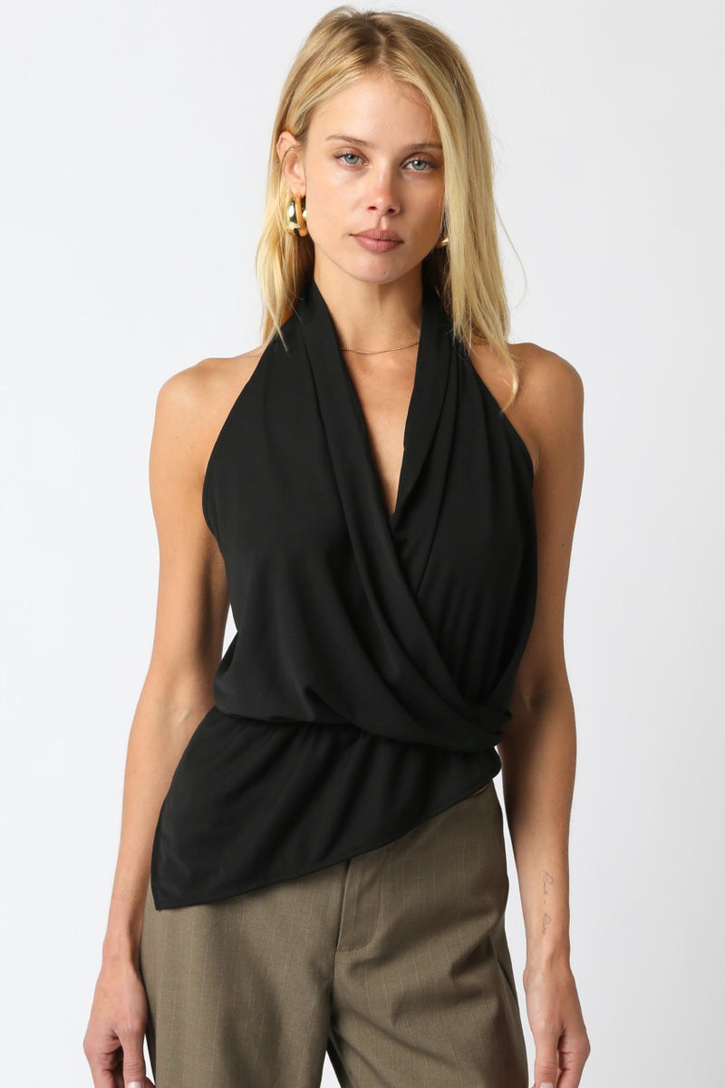 Chic black halter top featuring a draped silhouette and wrap design, perfect for elegant styling in any Long Island boutique fashion collection.