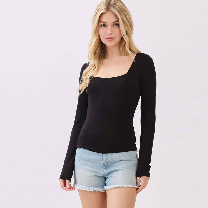 Sleek black double layer long sleeve top with a square neckline, perfectly pairing with shorts for a trendy look from a Long Island women's boutique.