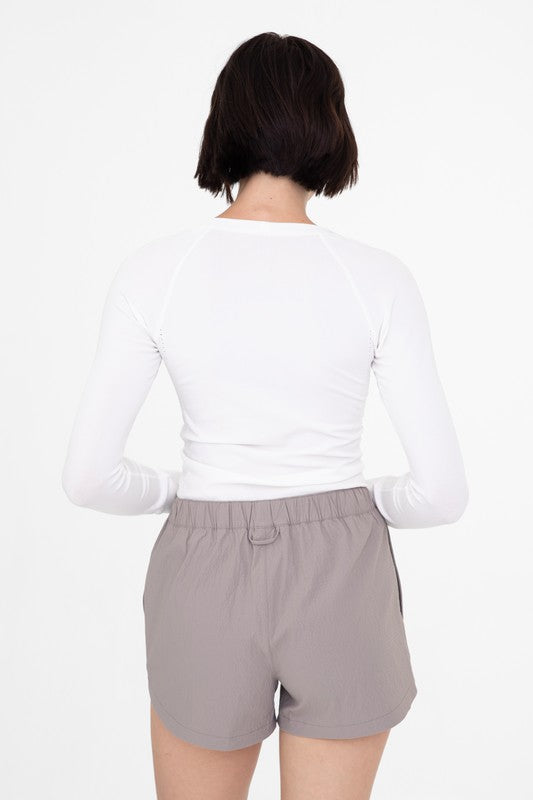 Seamless Perforated Top With Thumbholes