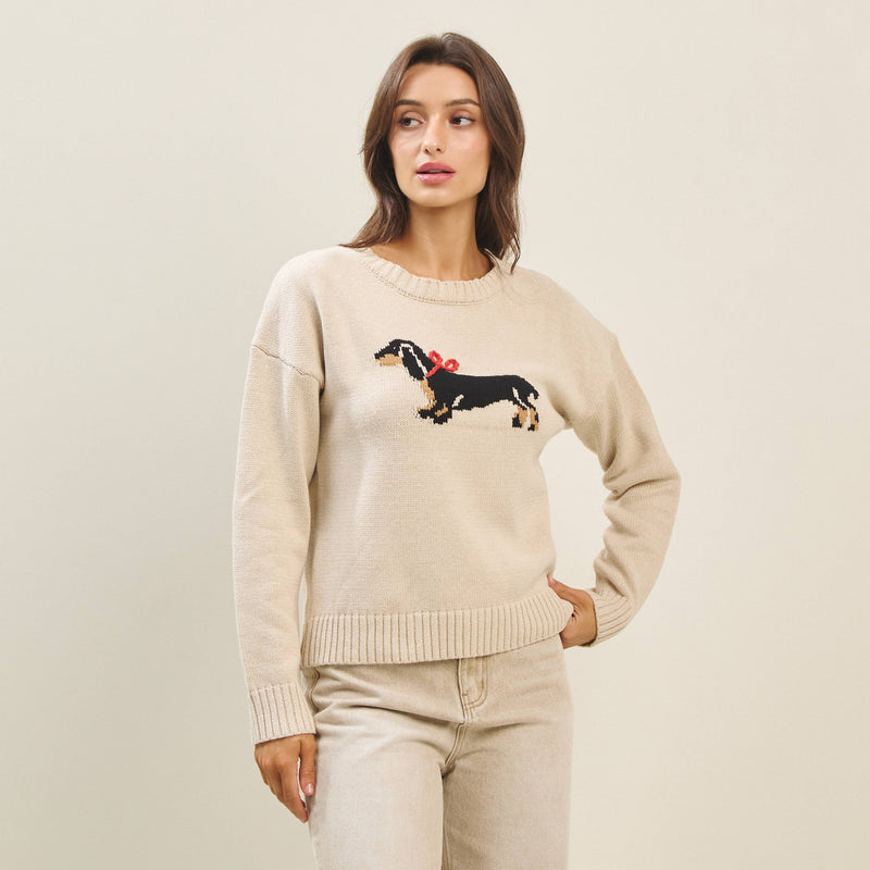 Cozy beige Bow Dog Sweater features a playful dachshund design with a red bow, perfect for stylish Long Island boutique fashion.